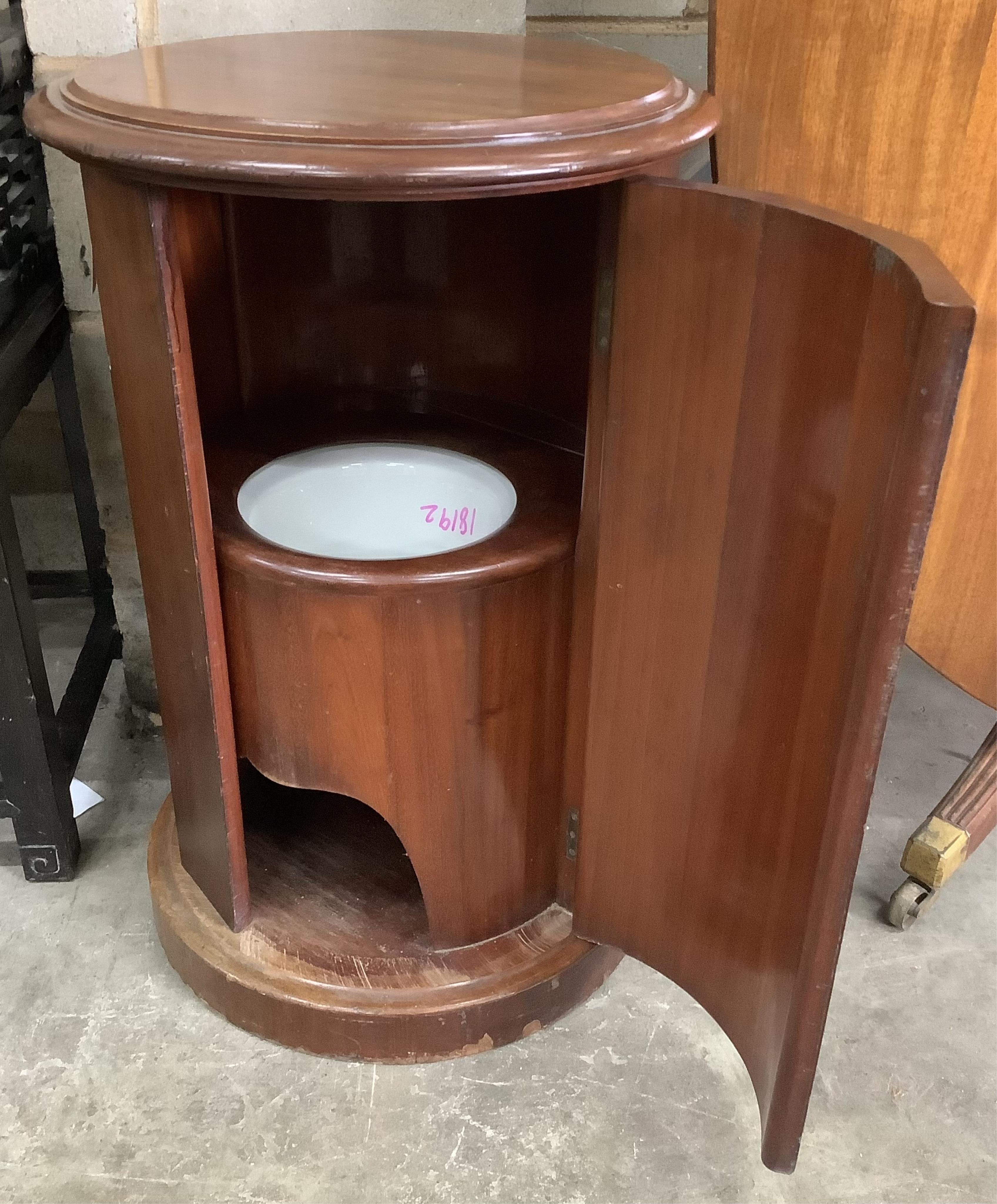 A Victorian mahogany cylindrical pot cupboard, diameter 48cm, height 75cm. Condition - fair